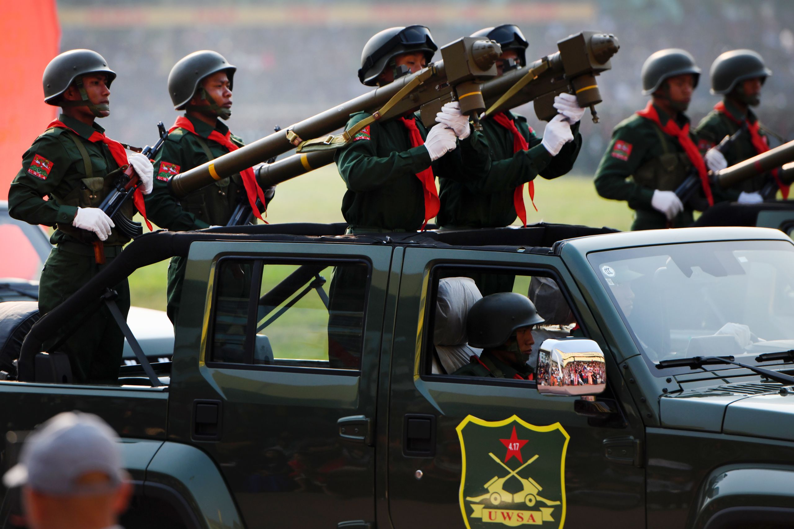 United Wa State Army (UWSA) soldiers participate in a military parade in Panghsang on April 17, 2019. The soldiers are shouldering MANPADS. (Photo by Ye Aung Thu/AFP)