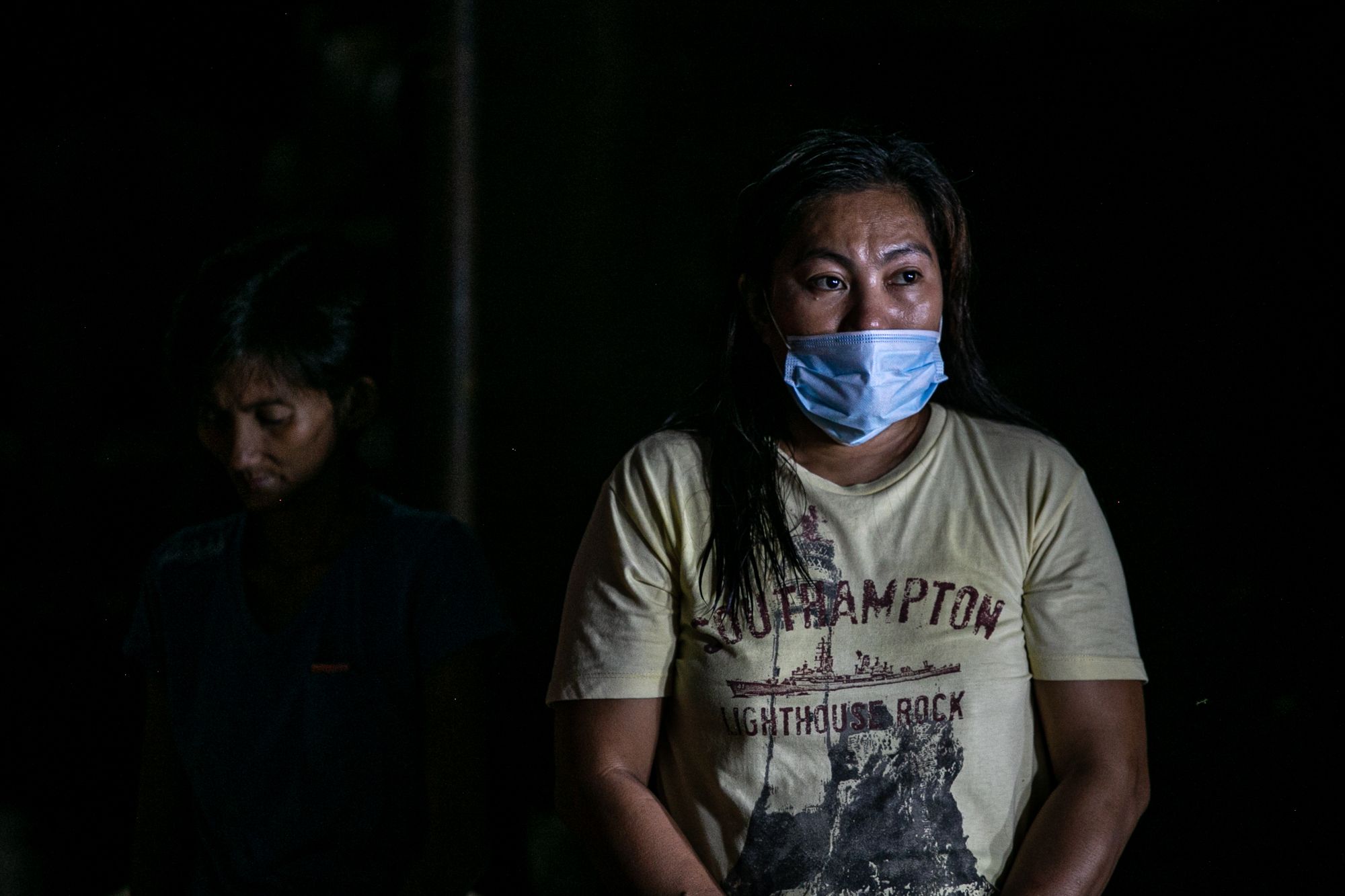 A resident attends the celebration of the Holy Eucharist on June 2.