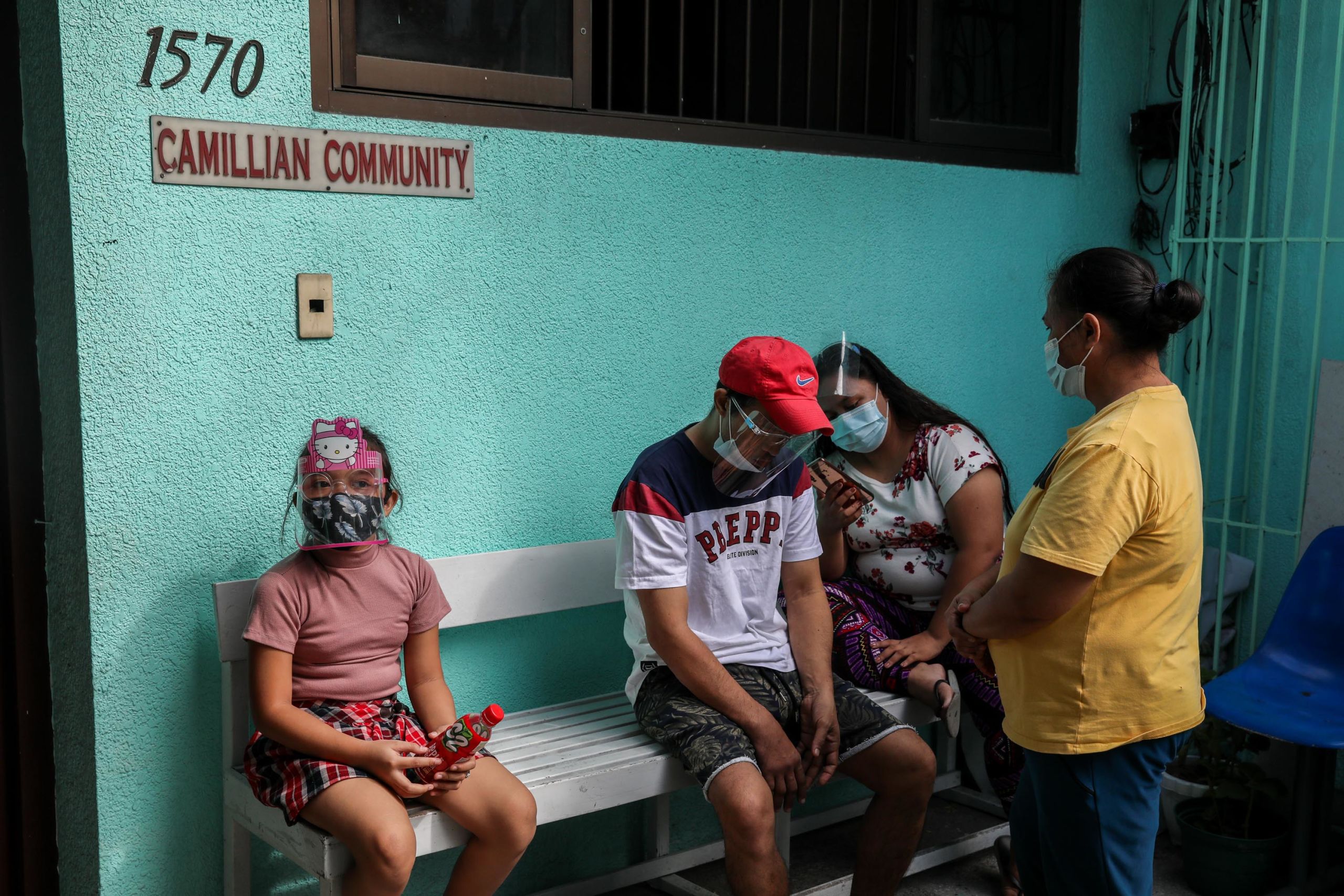 Patients wait for their turn at the clinic of the Camillians in Makati City