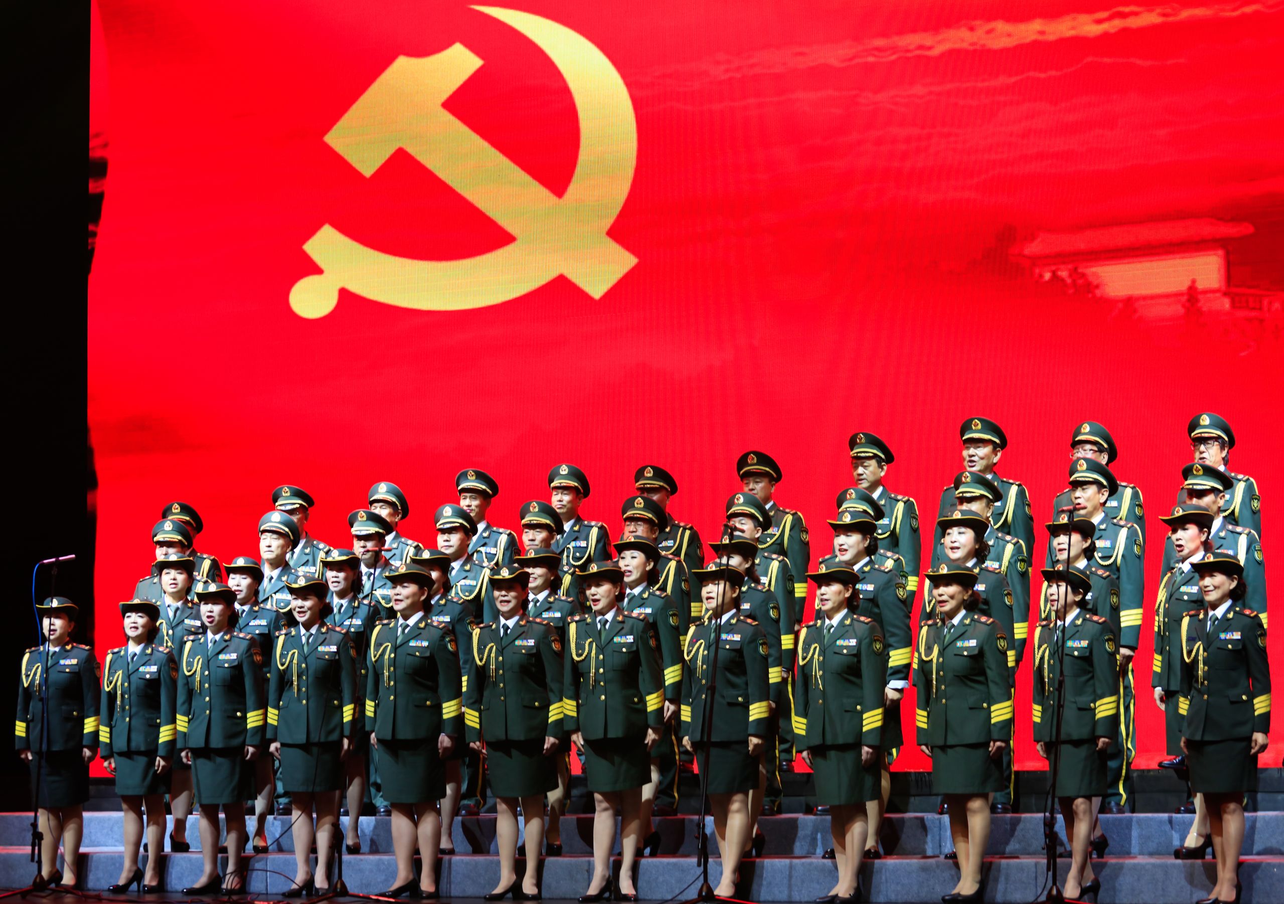 JIUJIANG CHINA-Nov 8, 2016:the military band of the Chinese people's Liberation Army under the leadership of the Communist Party of China was singing revolutionary songs for the audience on the stage.