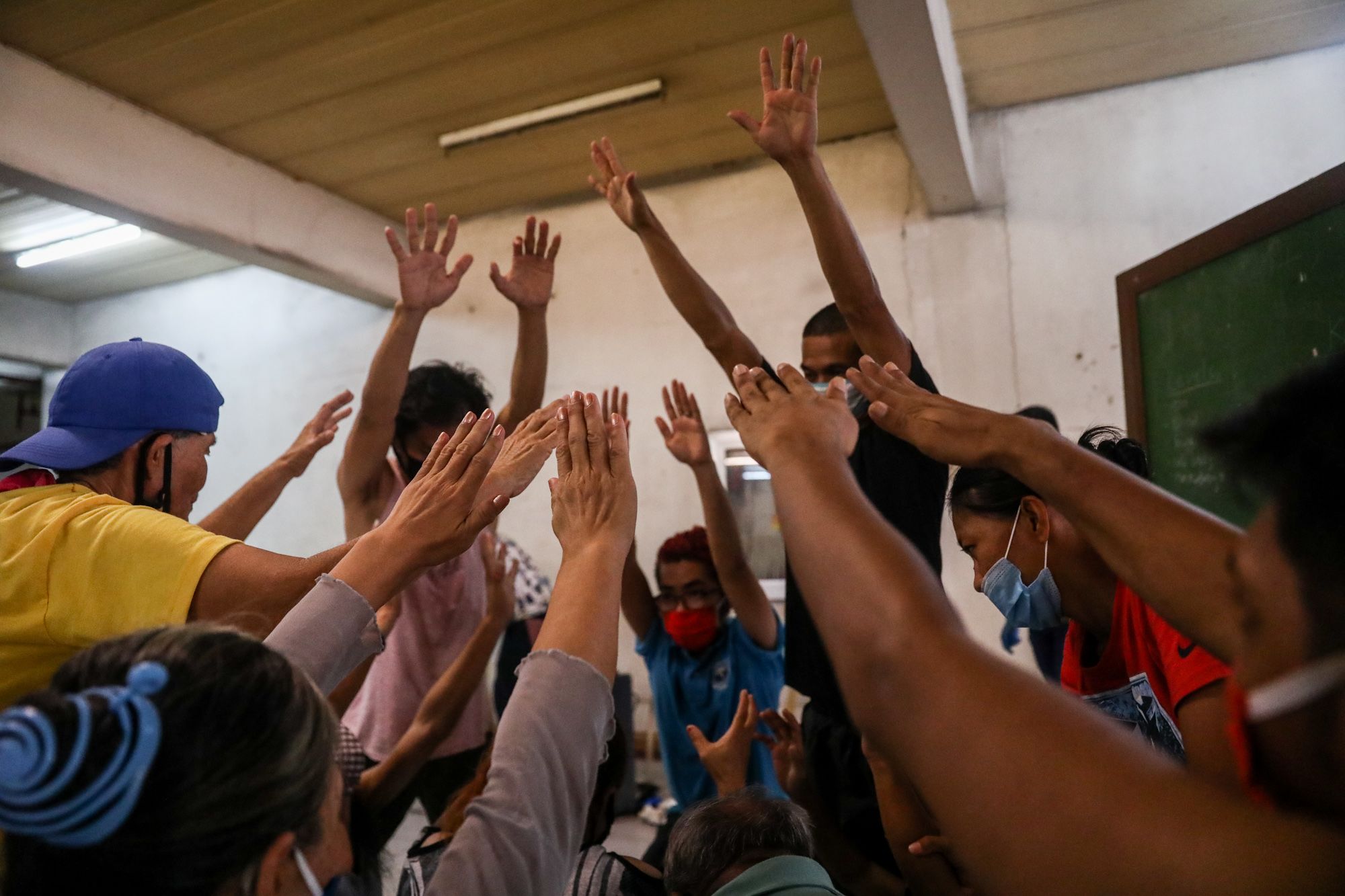 Homeless people join a theater workshop handled by Kalipaya Center, a church-based theater arts ministry.