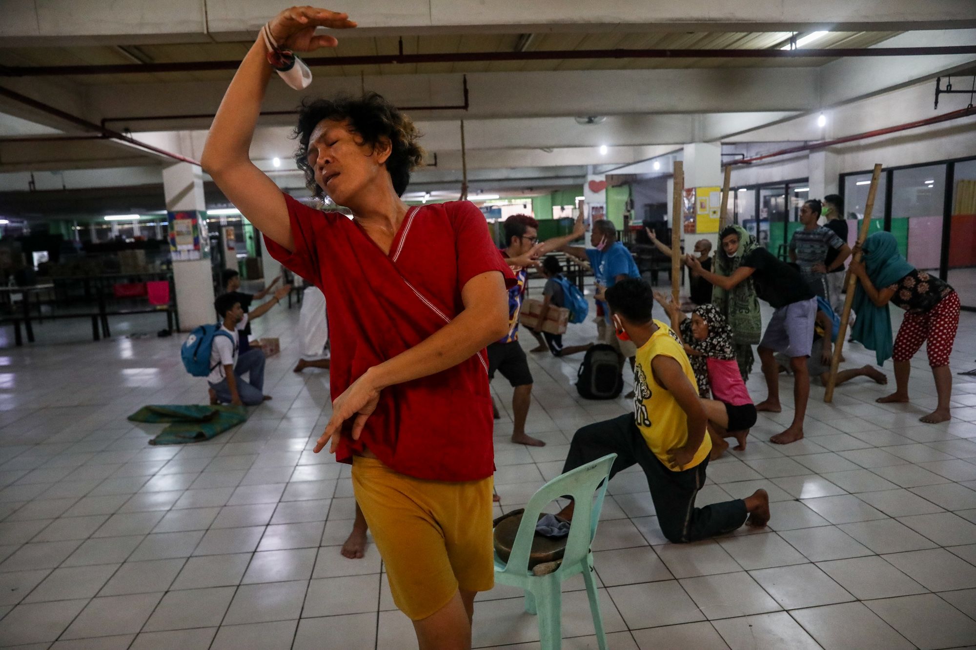 Roland Sanlao dances during rehearsals of the theater performance in Manila, Philippines, on May 28.