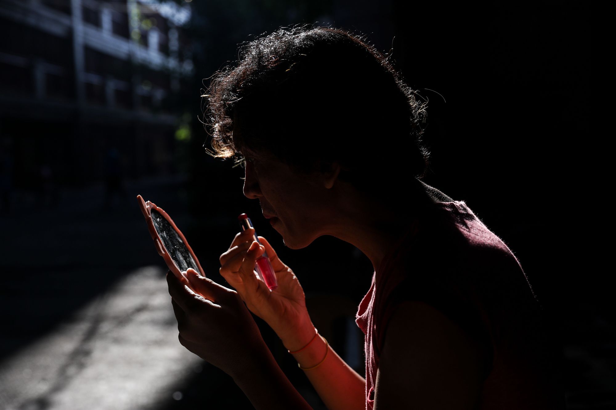 Roland Sanlao prepares for his performance at the Paco Catholic School in Manila, Philippines.
