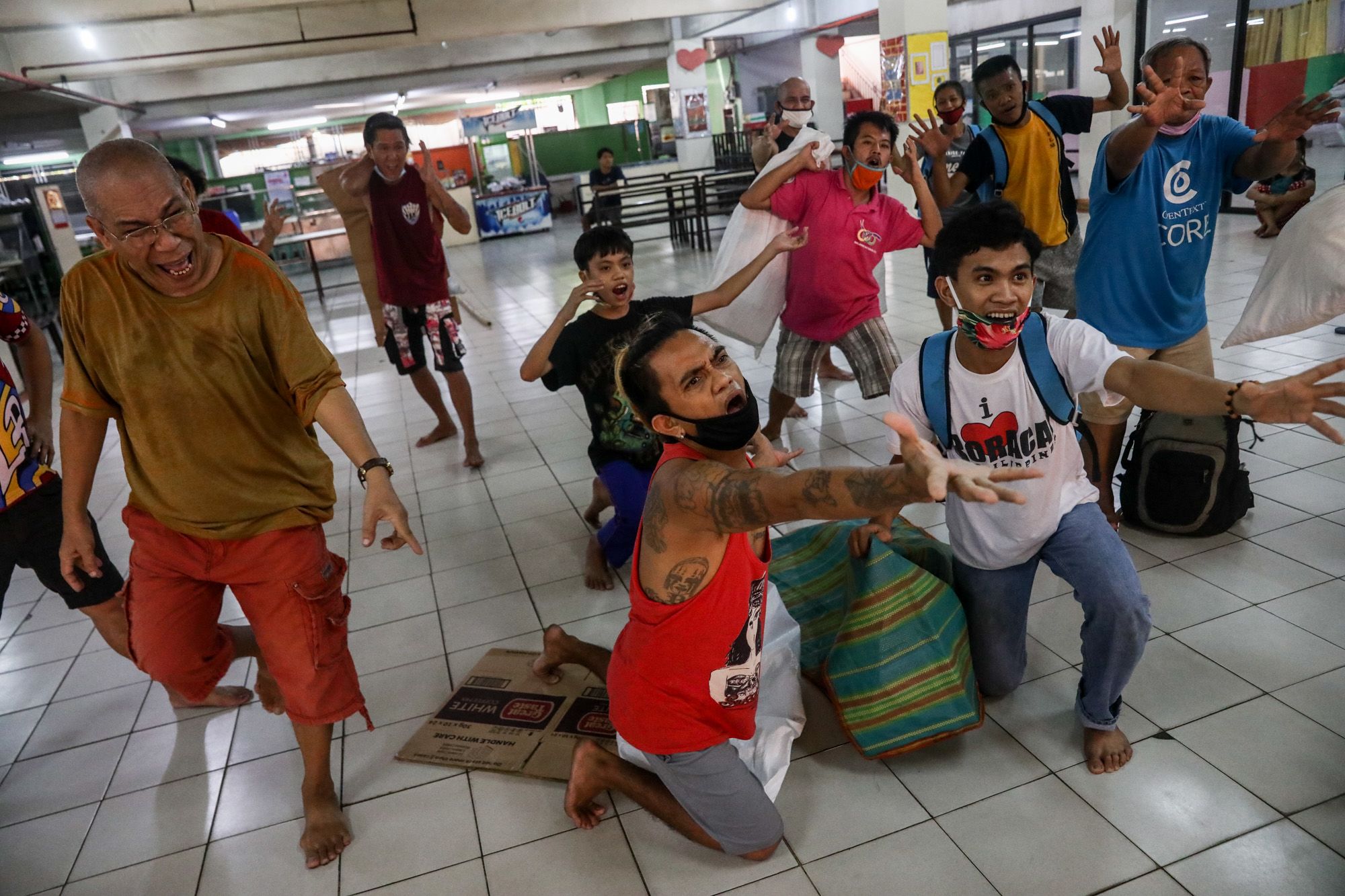 Albert Saldajeno directs the cast during the theater arts workshop at the Paco Catholic school in Manila, Philippines.
