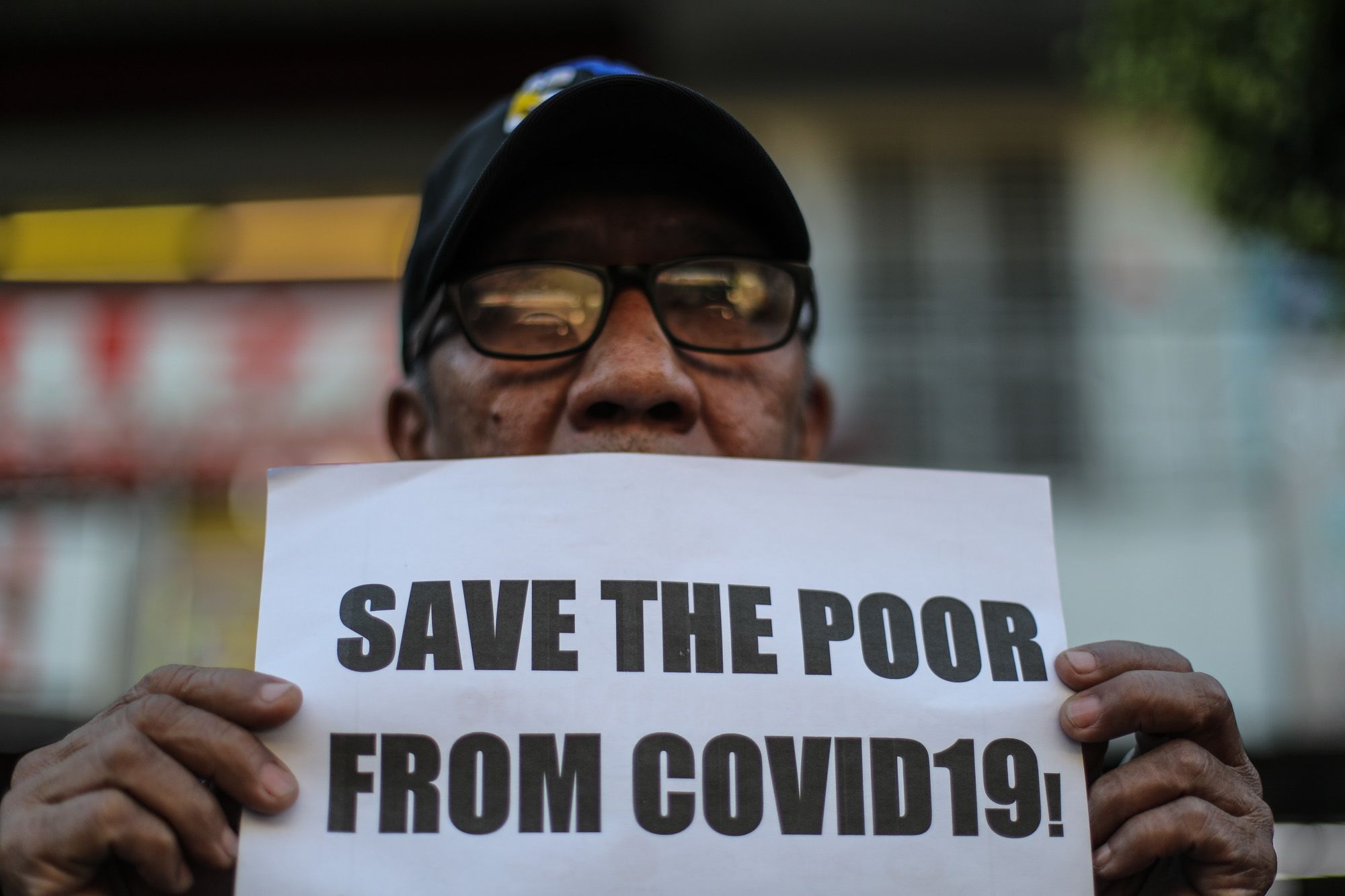 Members of the urban poor group Kadamay hold a demonstration in Manila to demand for government support for poor communities. The group said the lockdown will not help the poor to cope with the pandemic. (Photos by Jire Carreon)