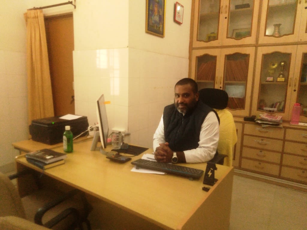 Father Senoj Thomas, director of St. Joseph's Community Hospital.