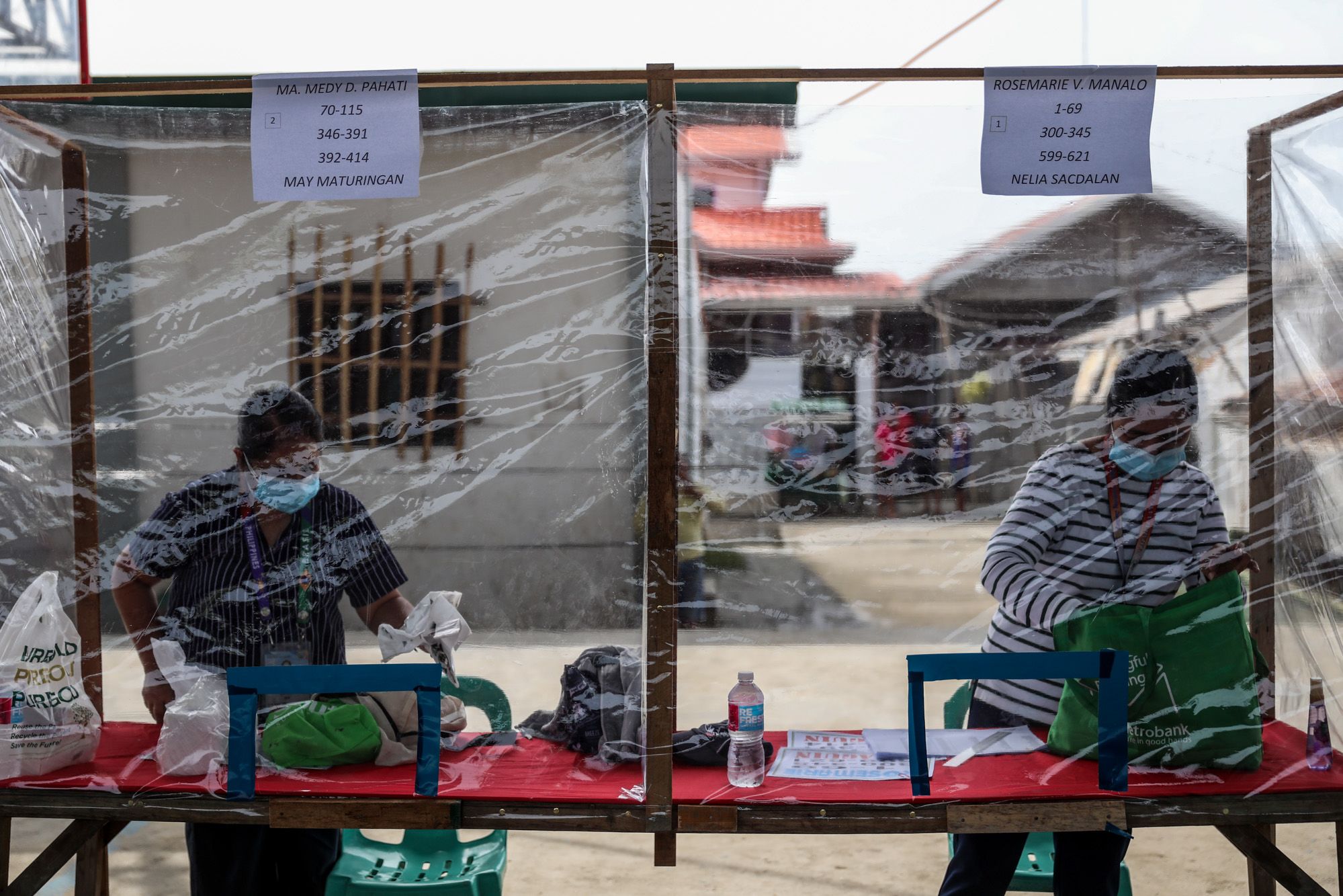 Maidy Pahati prepares for the cash distribution program in Tibaguin, Philippines