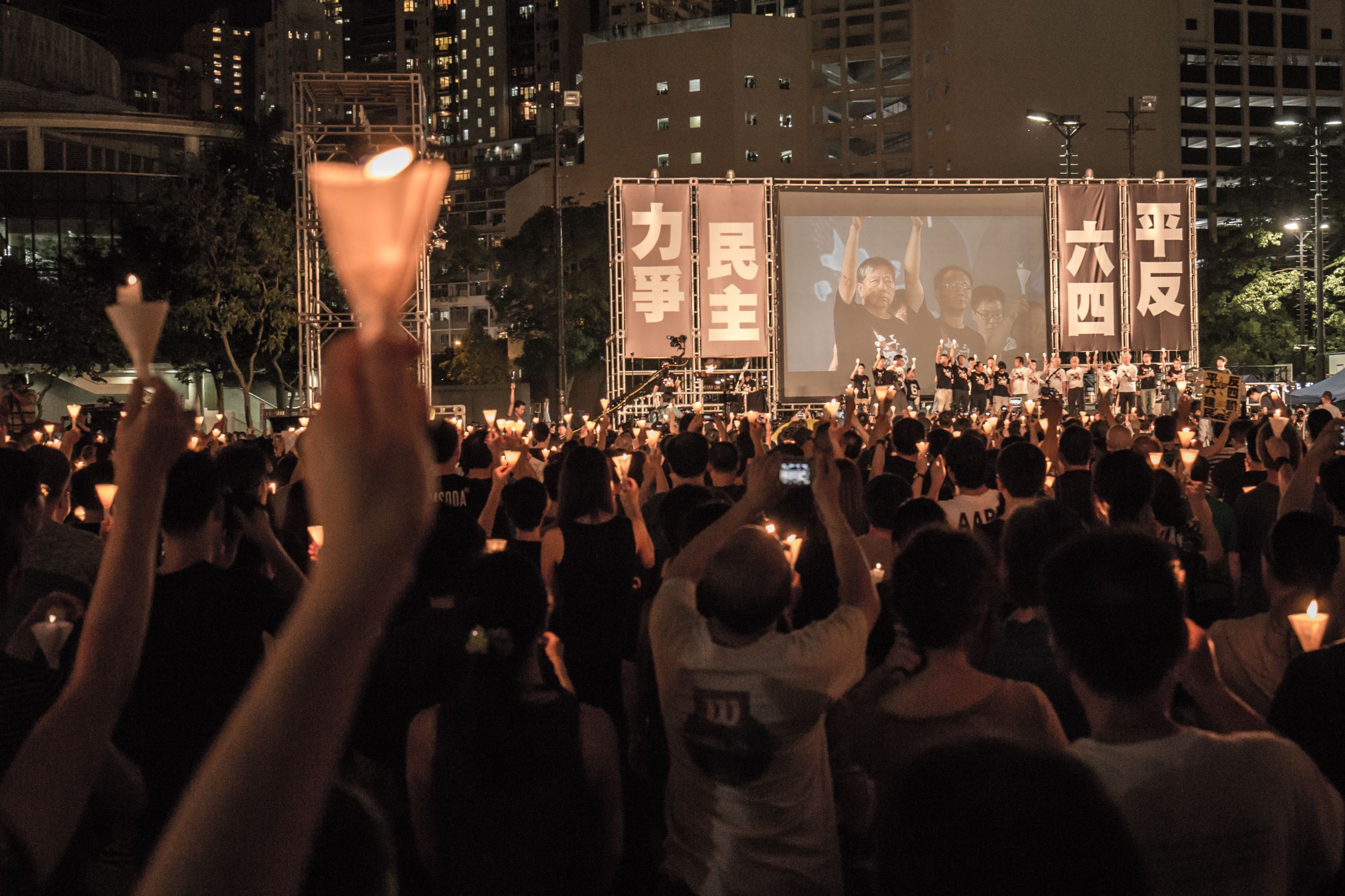 People in Hong Kong call for genuine democracy and commemorate the Tiananmen Square Massacre in Victoria Park on June 4, 2016. (shutterstock.com photo)