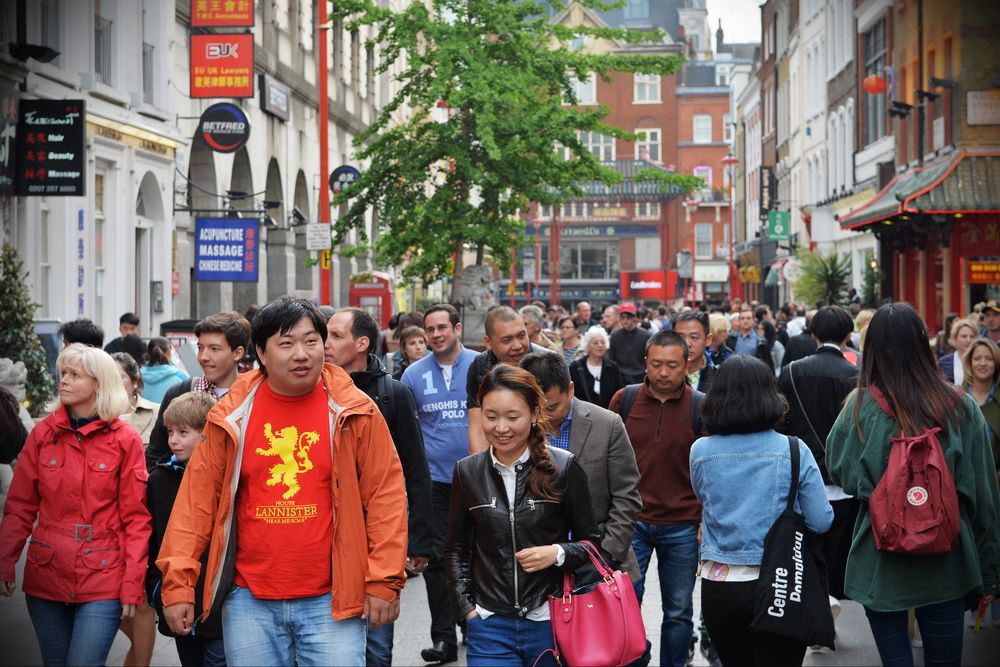 A file image of people in a busy shopping street in London's Chinatown on May 30, 2015. (shutterstock.com photo)