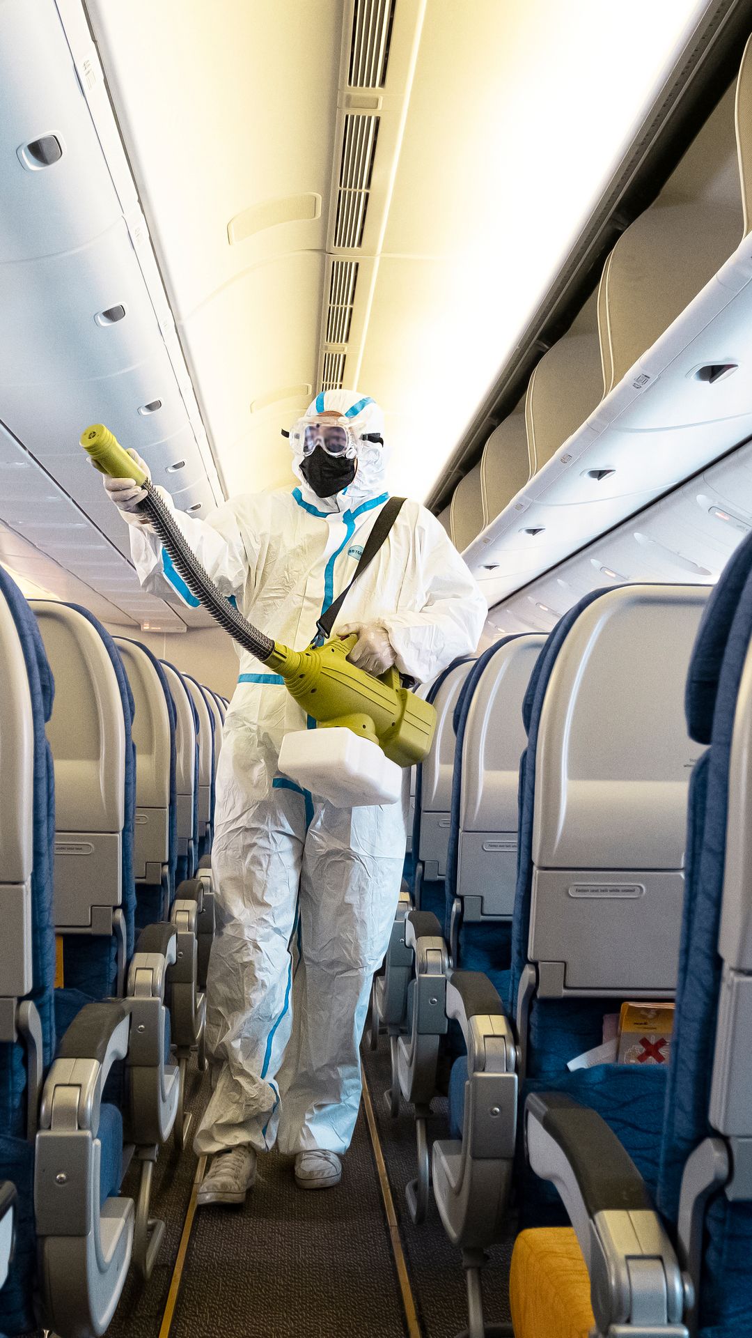 Covid-19 disease prevention. Aircraft interior cabin deep cleaning for coronavirus.