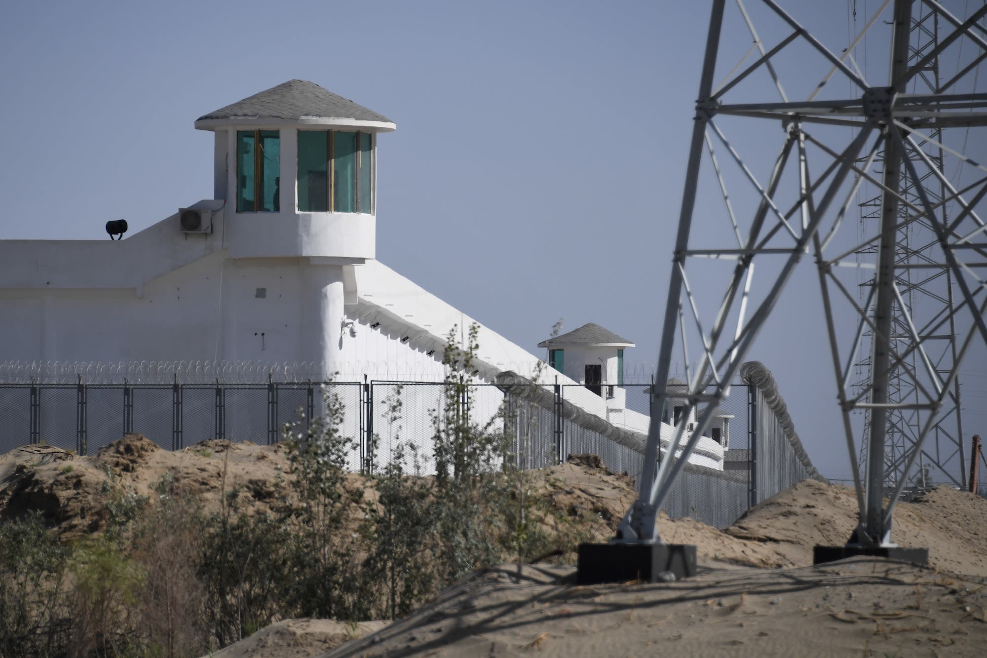 Watchtowers on a high-security facility near what is believed to be a re-education camp where mostly Muslim ethnic minorities are detained